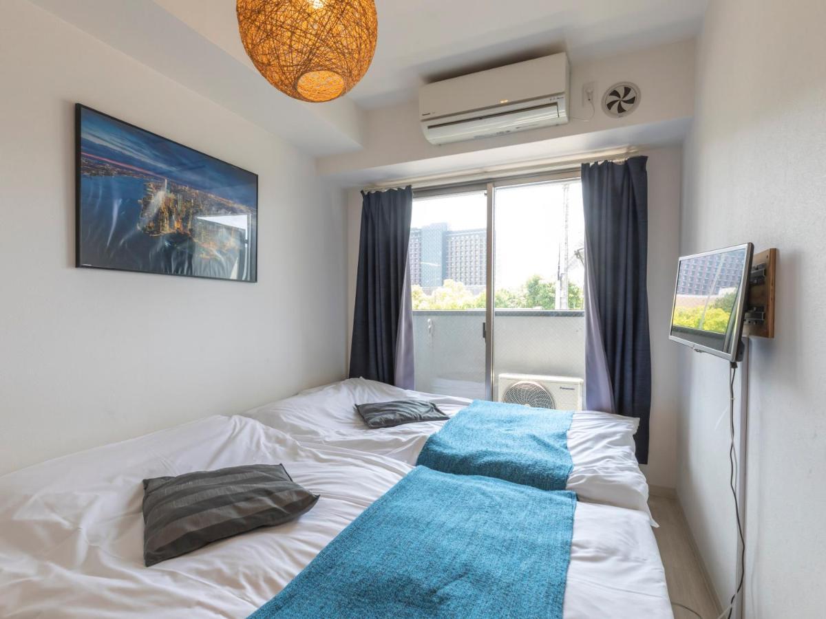 Appartement Tabist Gloire Ōsaka Extérieur photo